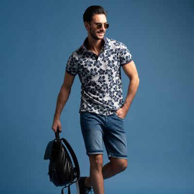 Polo uomo manica corta realizzata in cotone piquet melange con stampa floreale